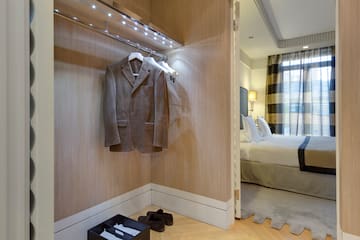 a room with a coat on a rack