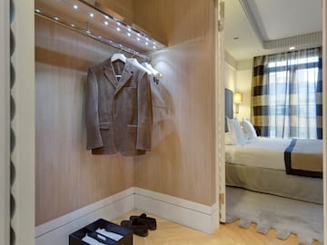 a room with a coat on a rack
