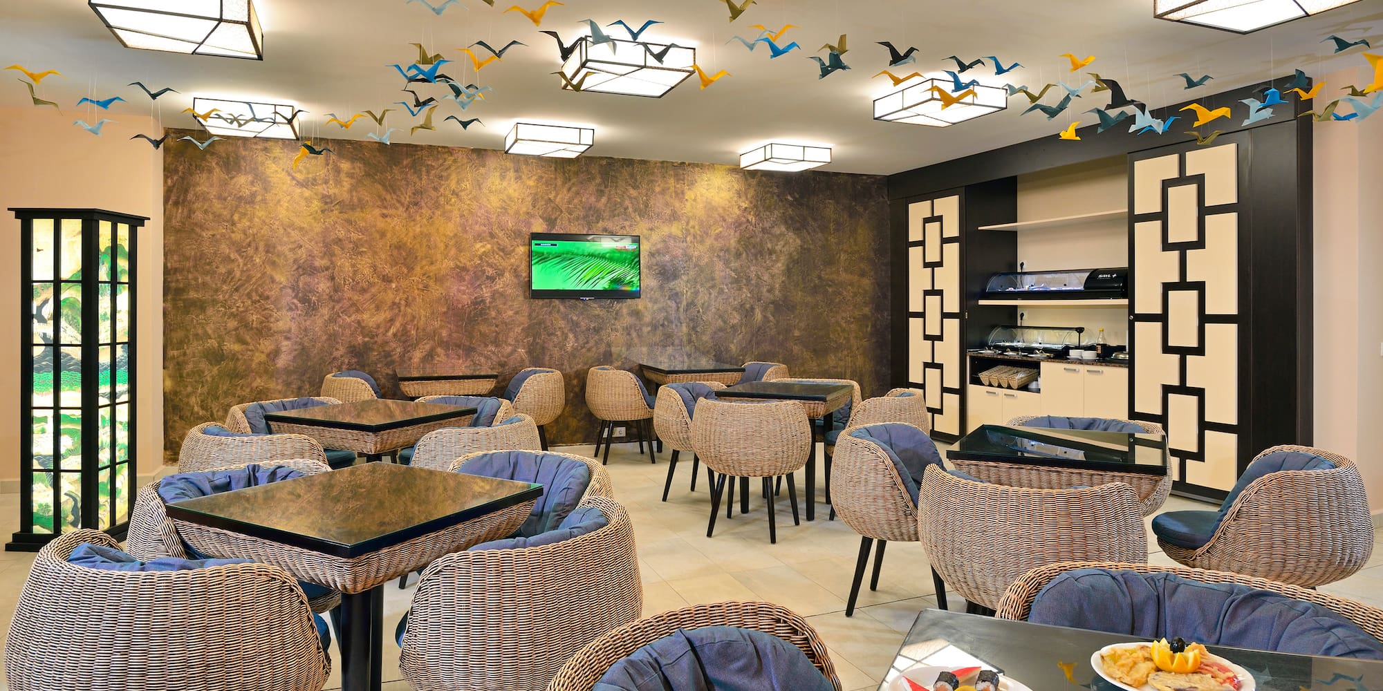 a room with tables and chairs