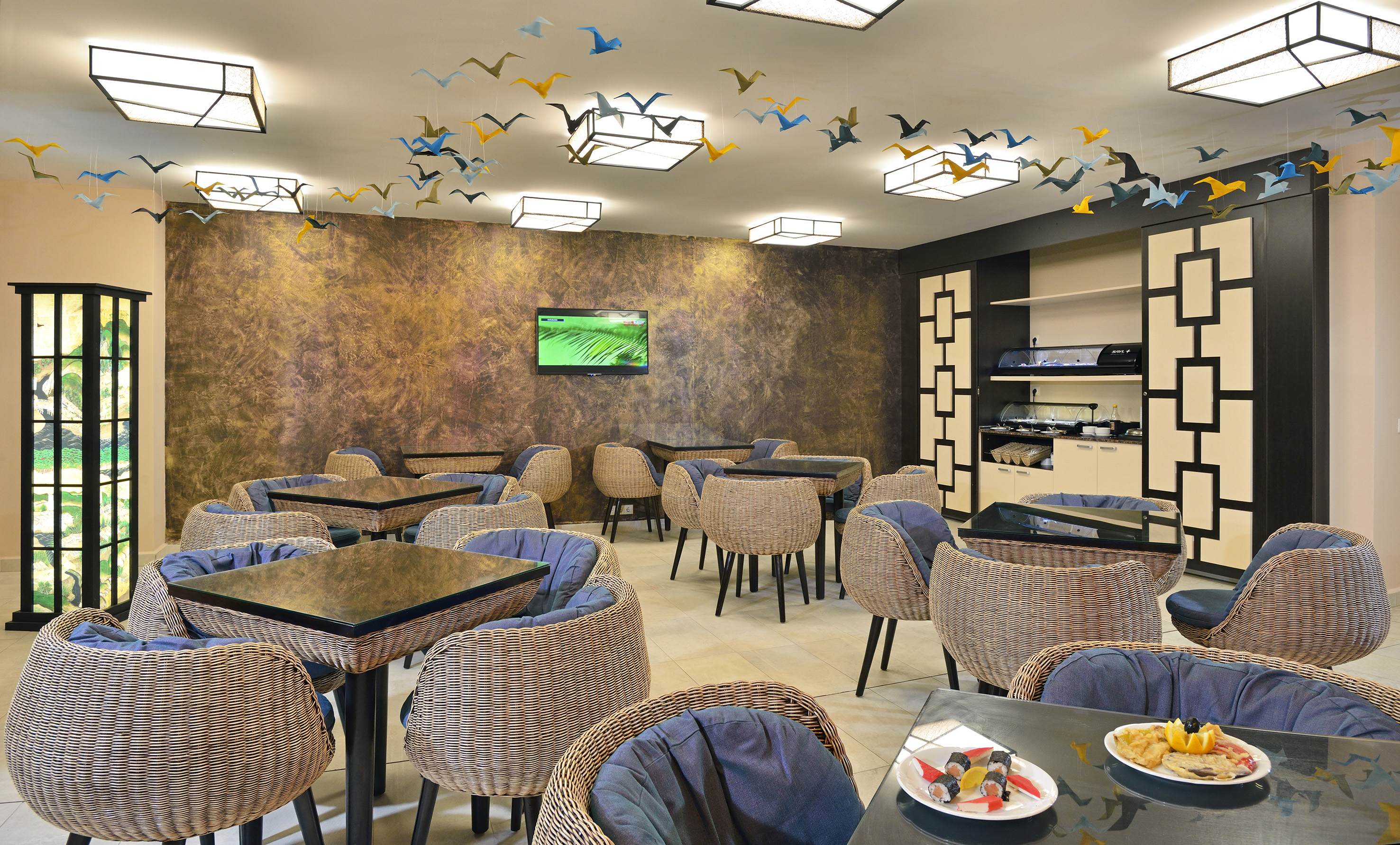 a room with tables and chairs