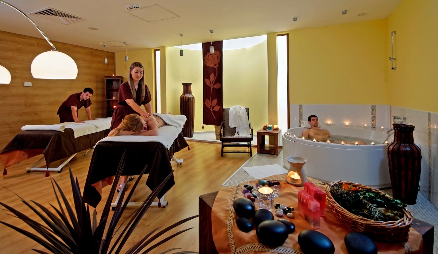 a group of people in a spa room