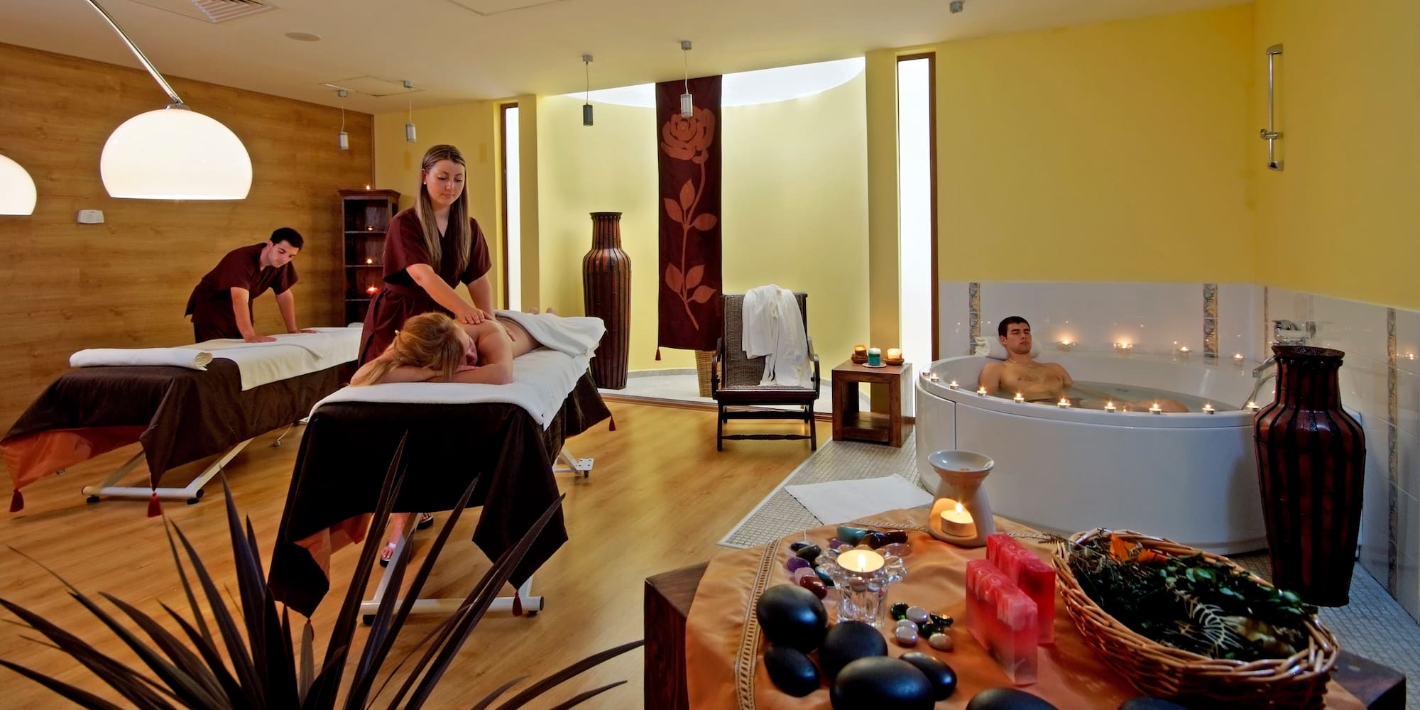 a group of people in a spa room