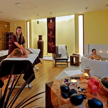 a group of people in a spa room