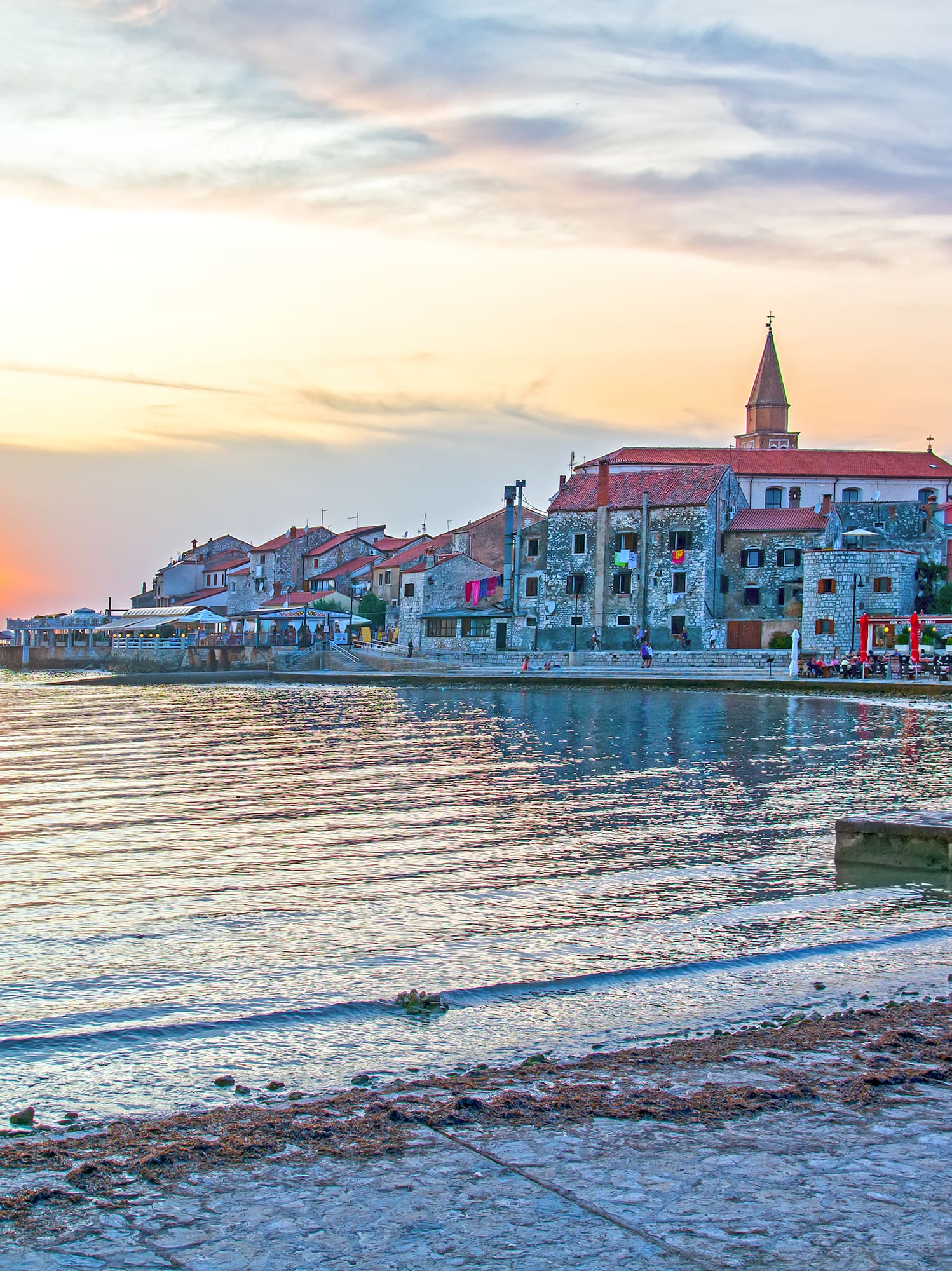 a sunset over a body of water