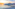 a sunset over a body of water