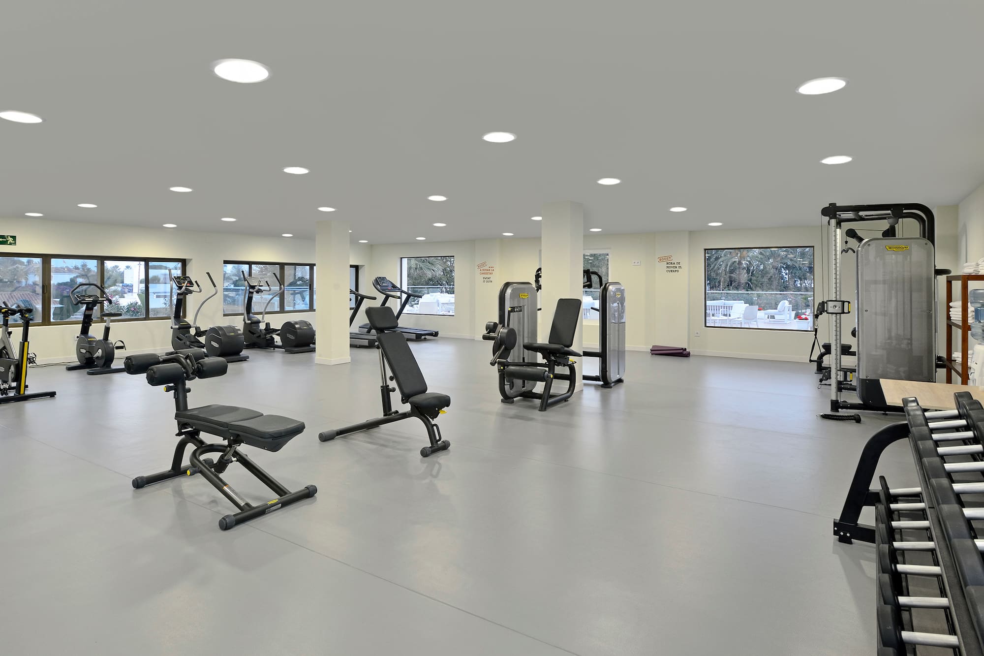 a large gym with exercise equipment