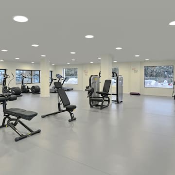 a large gym with exercise equipment