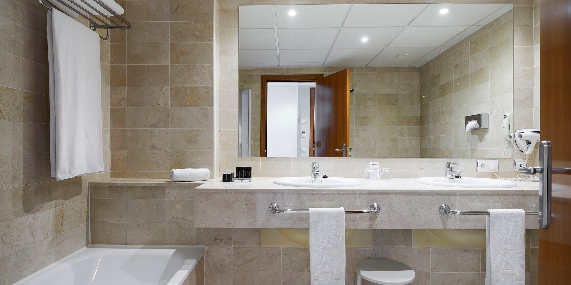a bathroom with a sink and bathtub