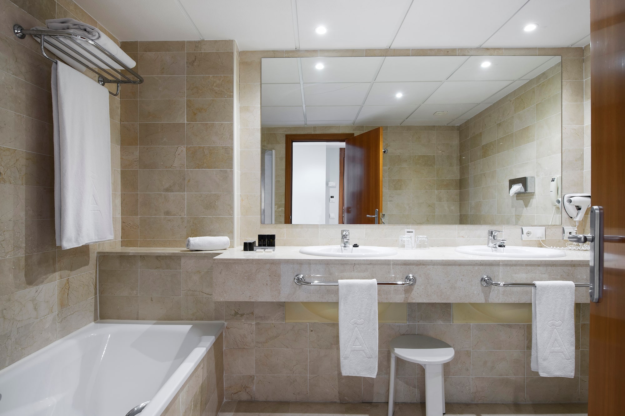 a bathroom with a sink and bathtub