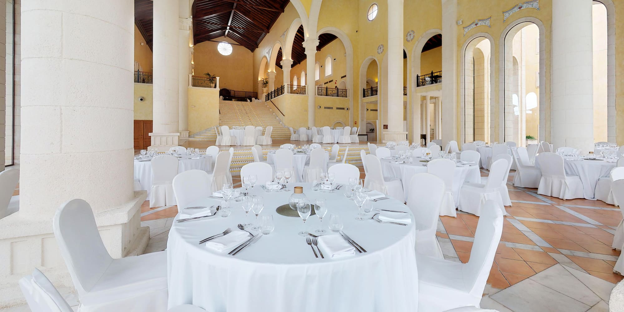 a room with tables and chairs
