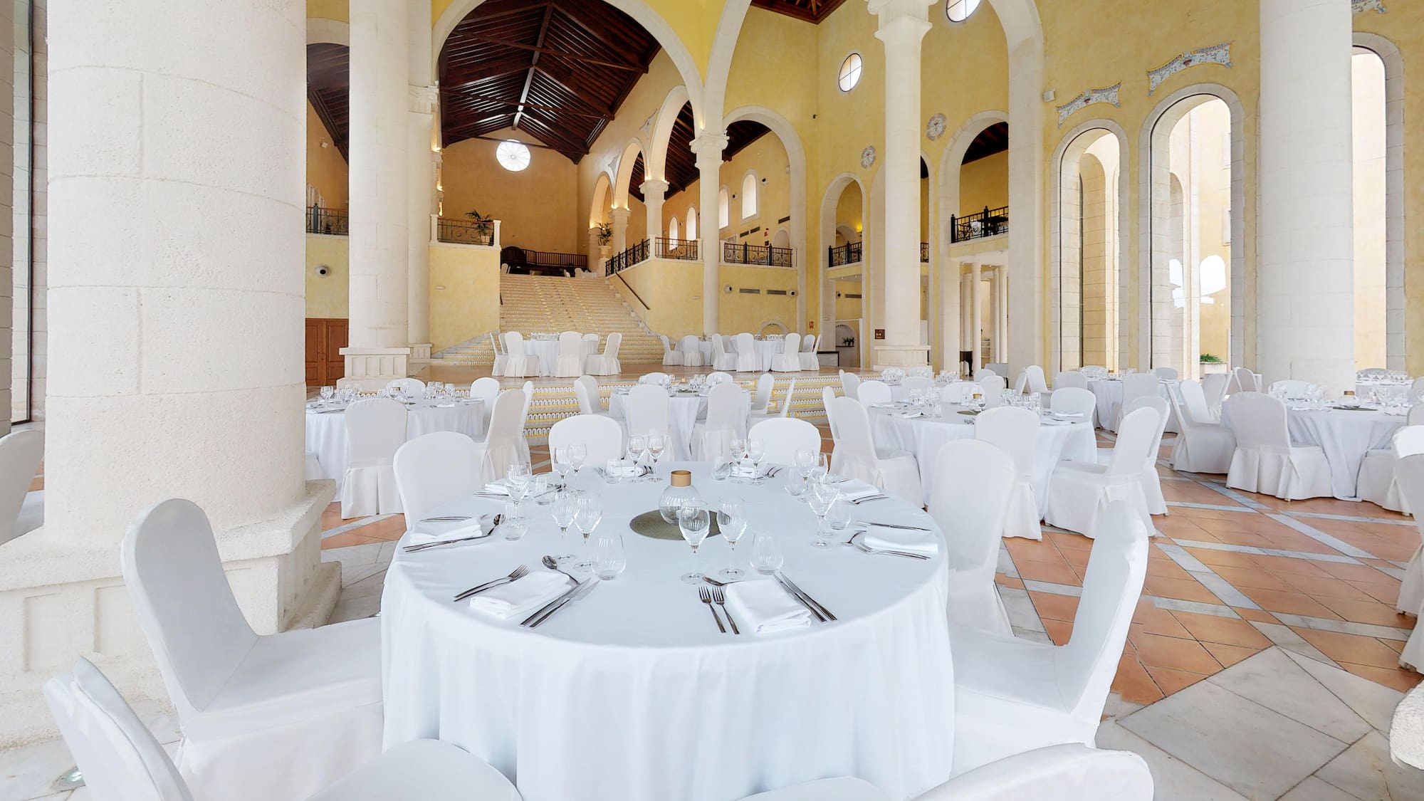 a room with tables and chairs