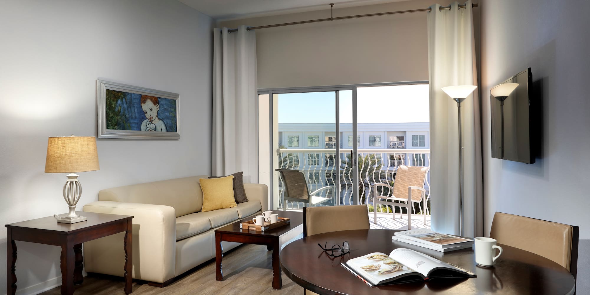 a living room with a couch and a table