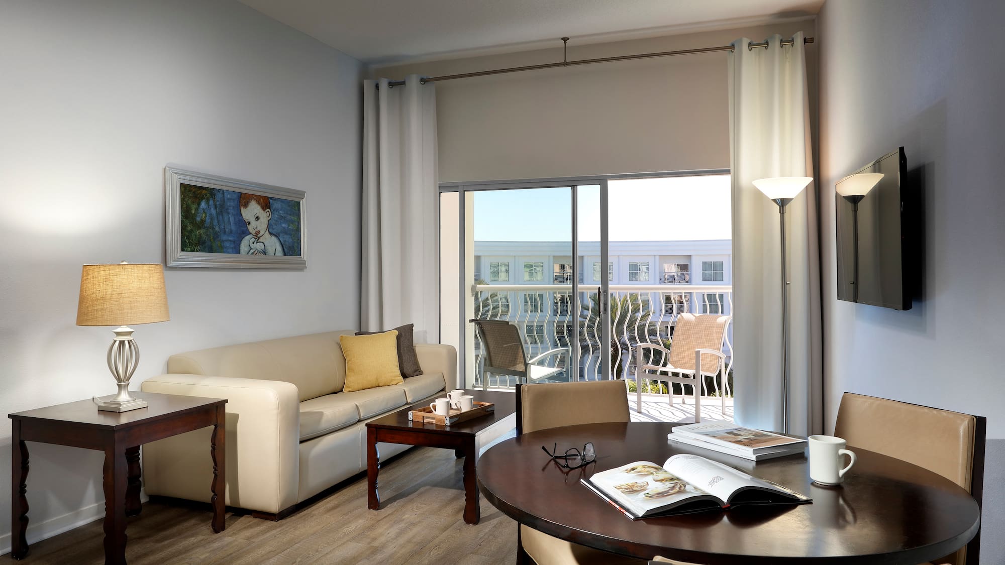 a living room with a couch and a table