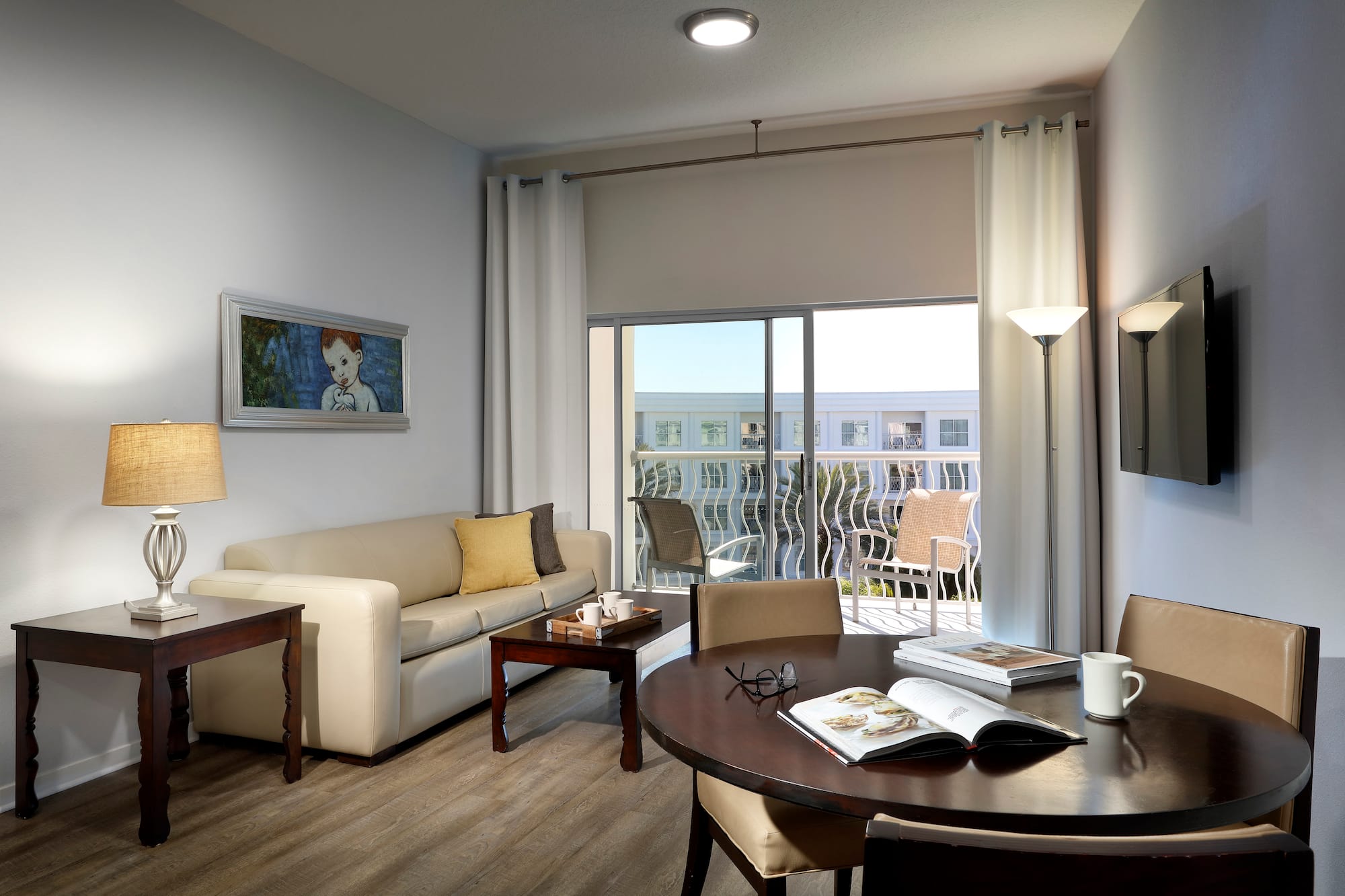 a living room with a couch and a table