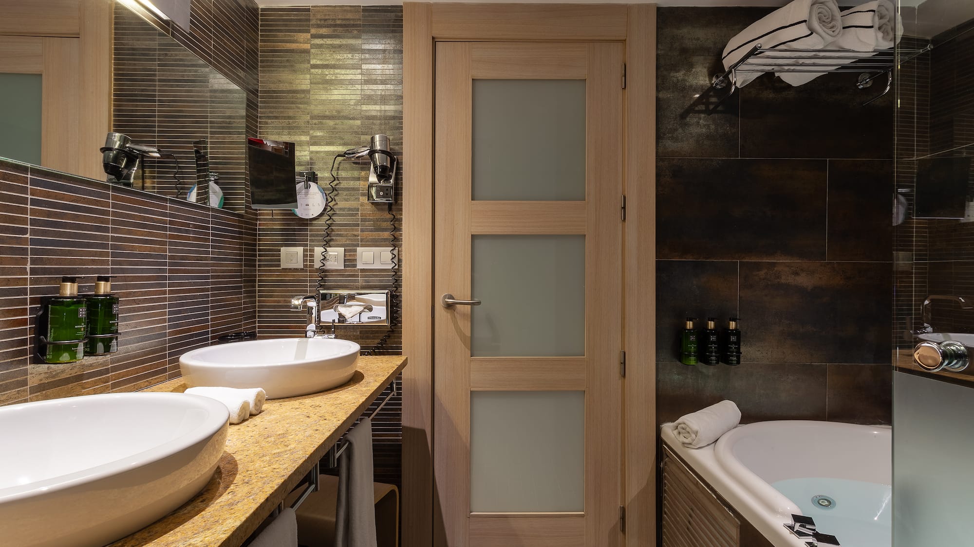 a bathroom with a sink and tub