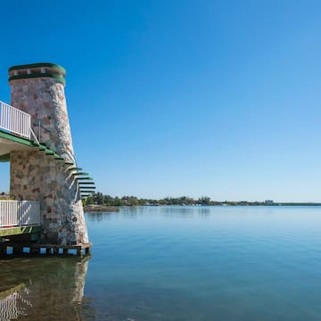 a building with a staircase on the water
