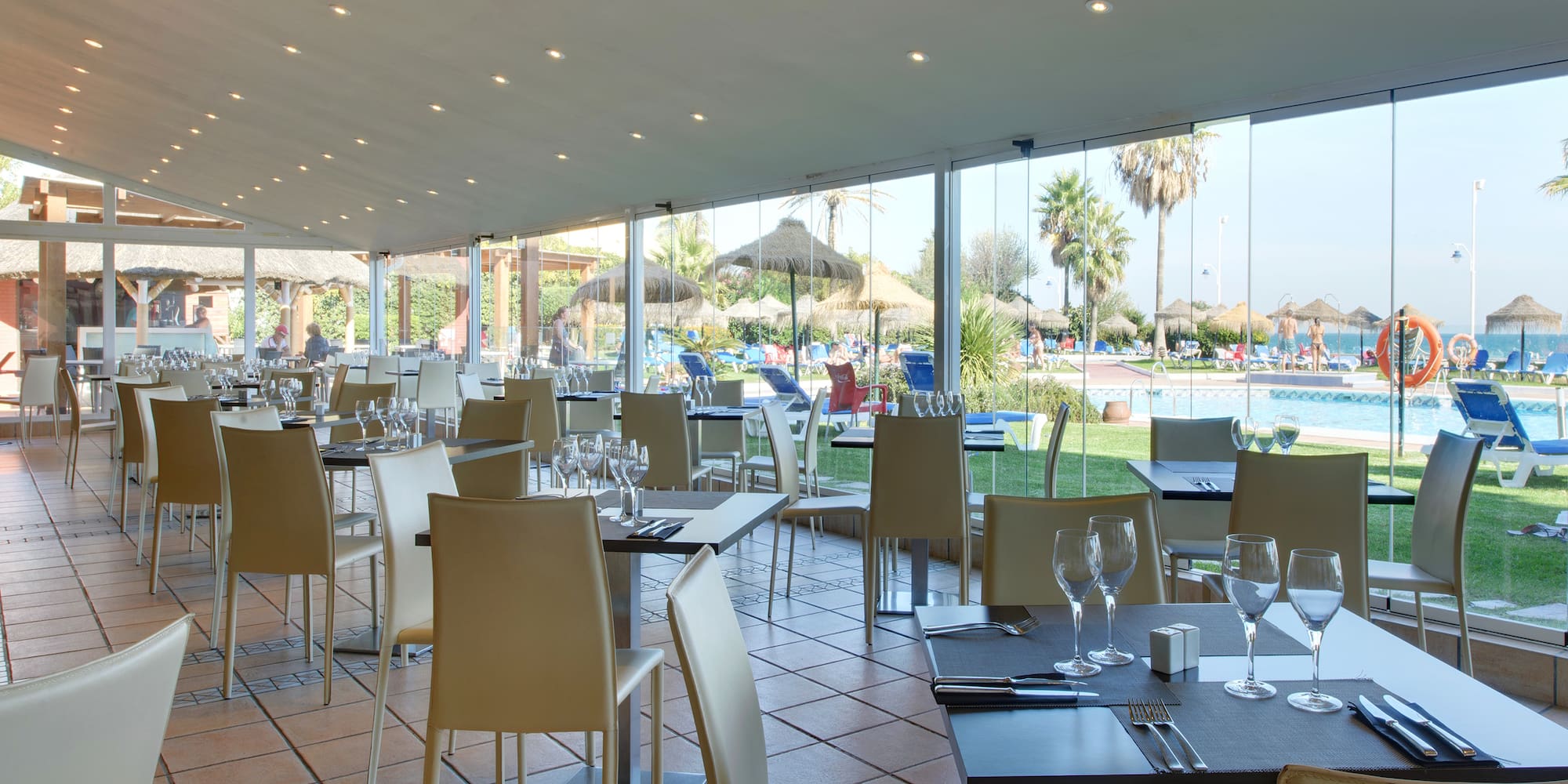 a restaurant with tables and chairs