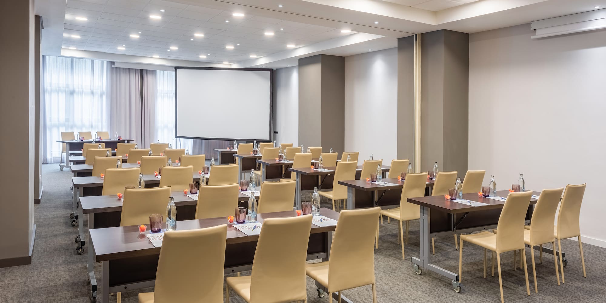 a room with tables and chairs