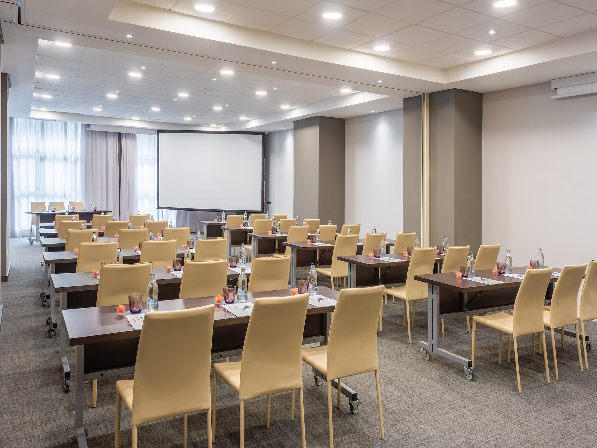 a room with tables and chairs