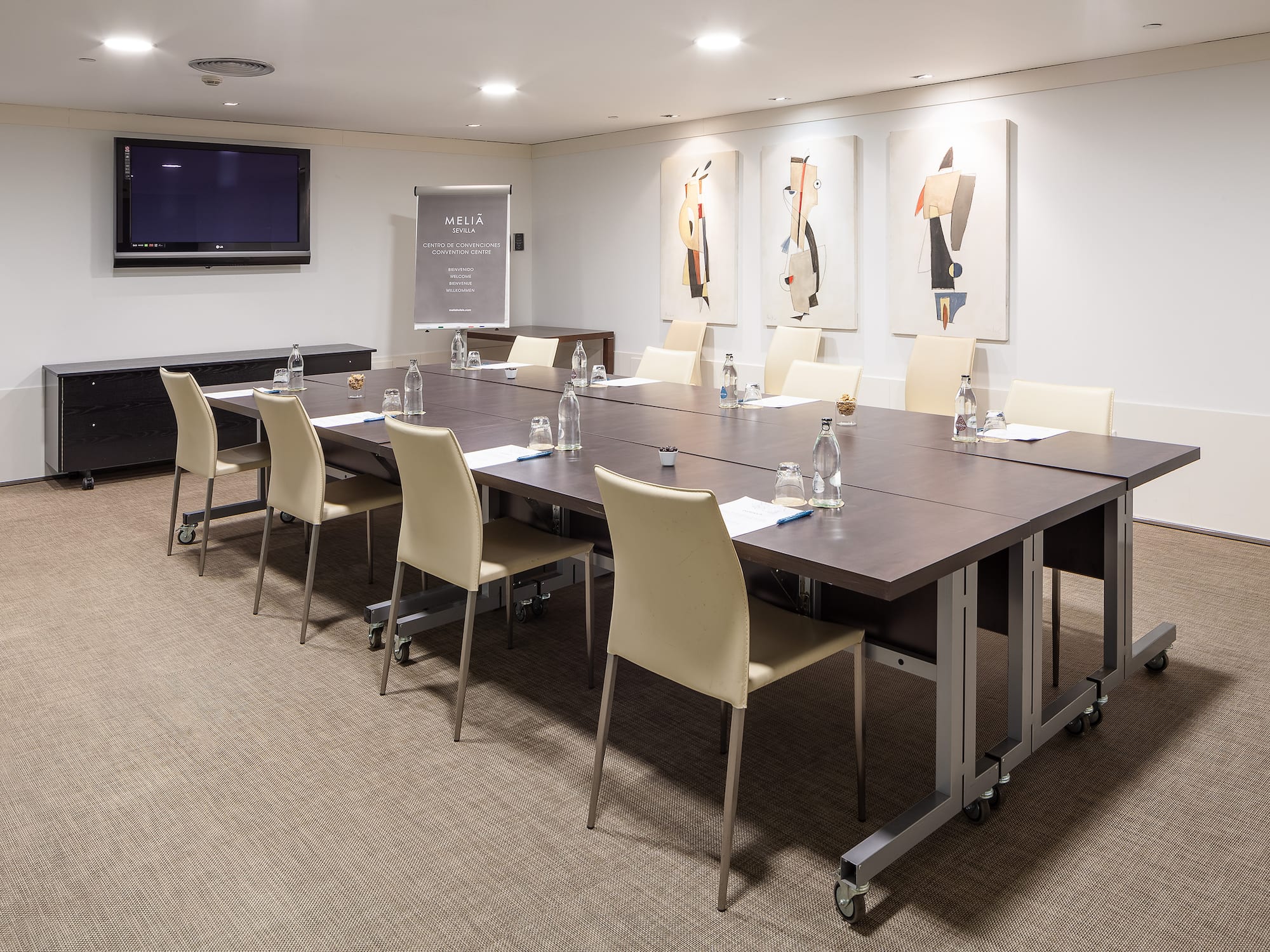 a room with a table and chairs