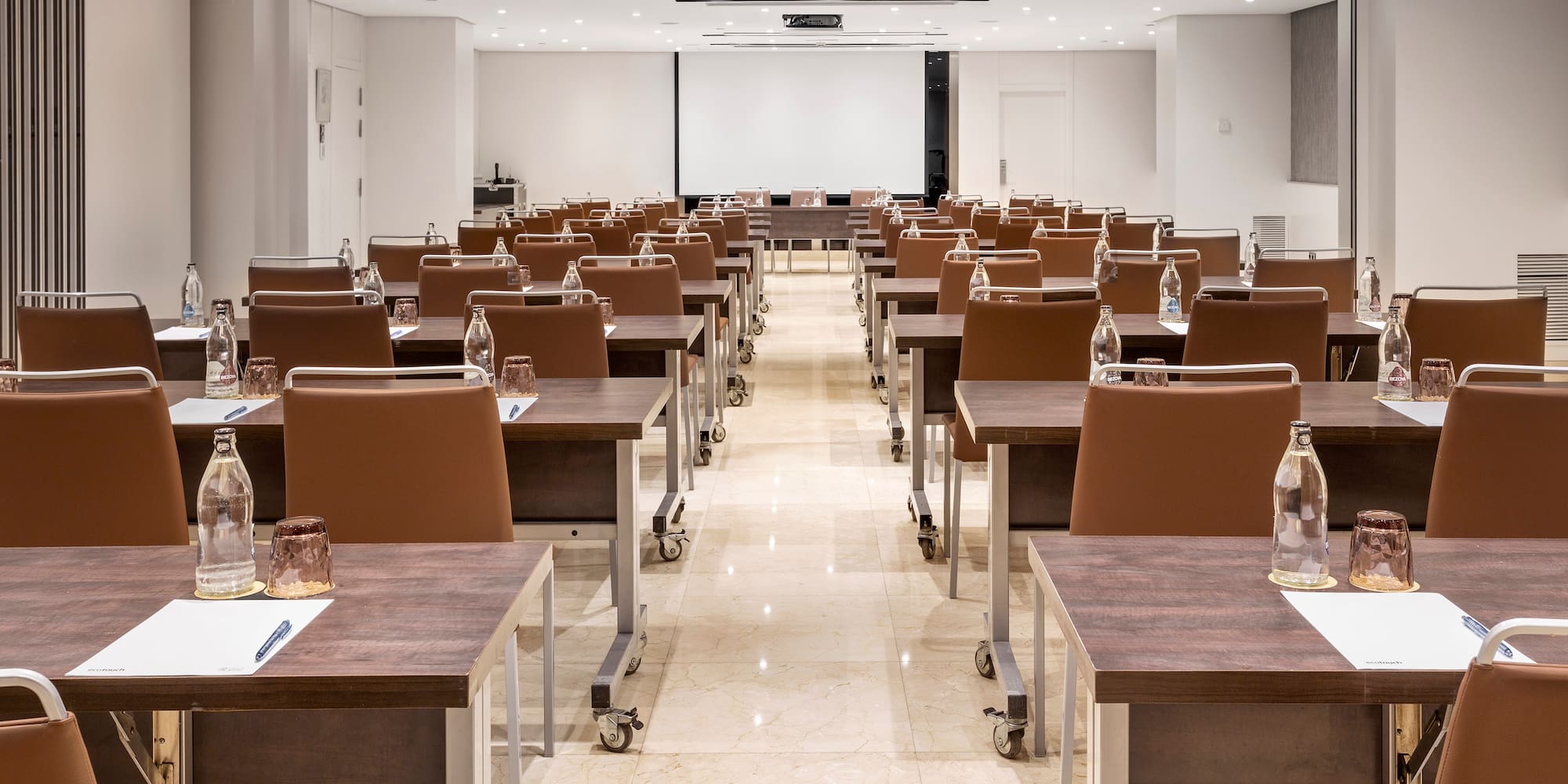 a room with tables and chairs