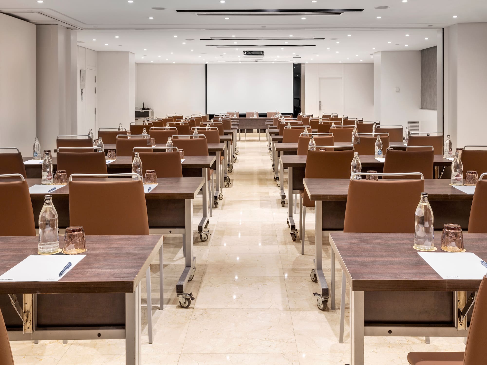 a room with tables and chairs