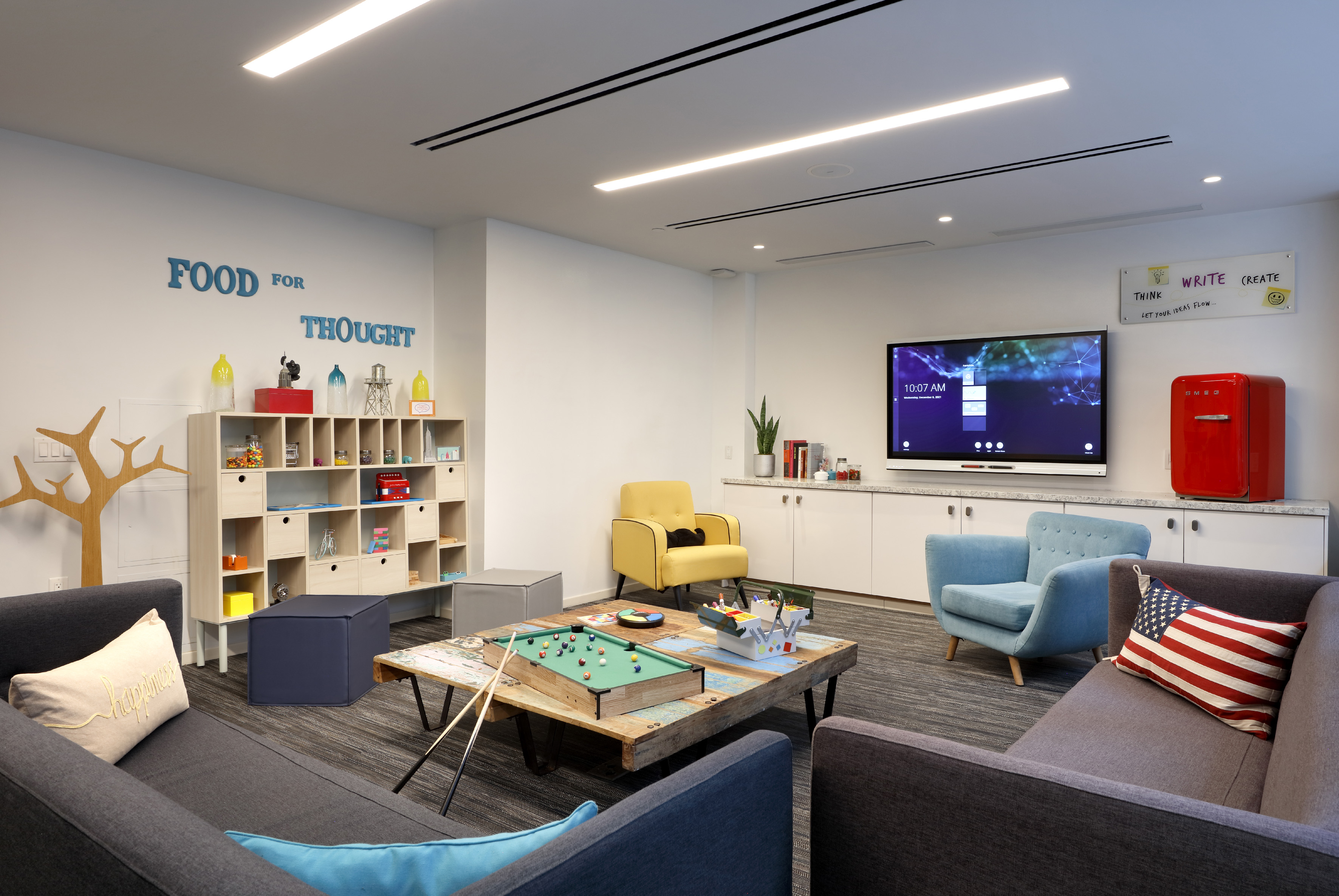 a room with a television and a table.