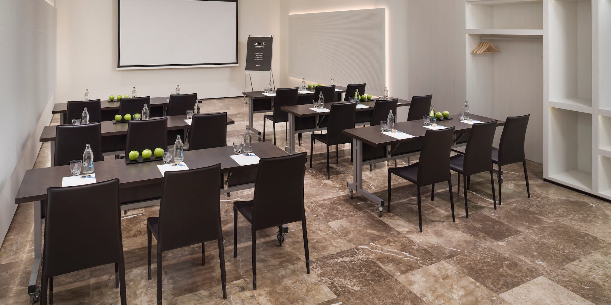 a room with tables and chairs