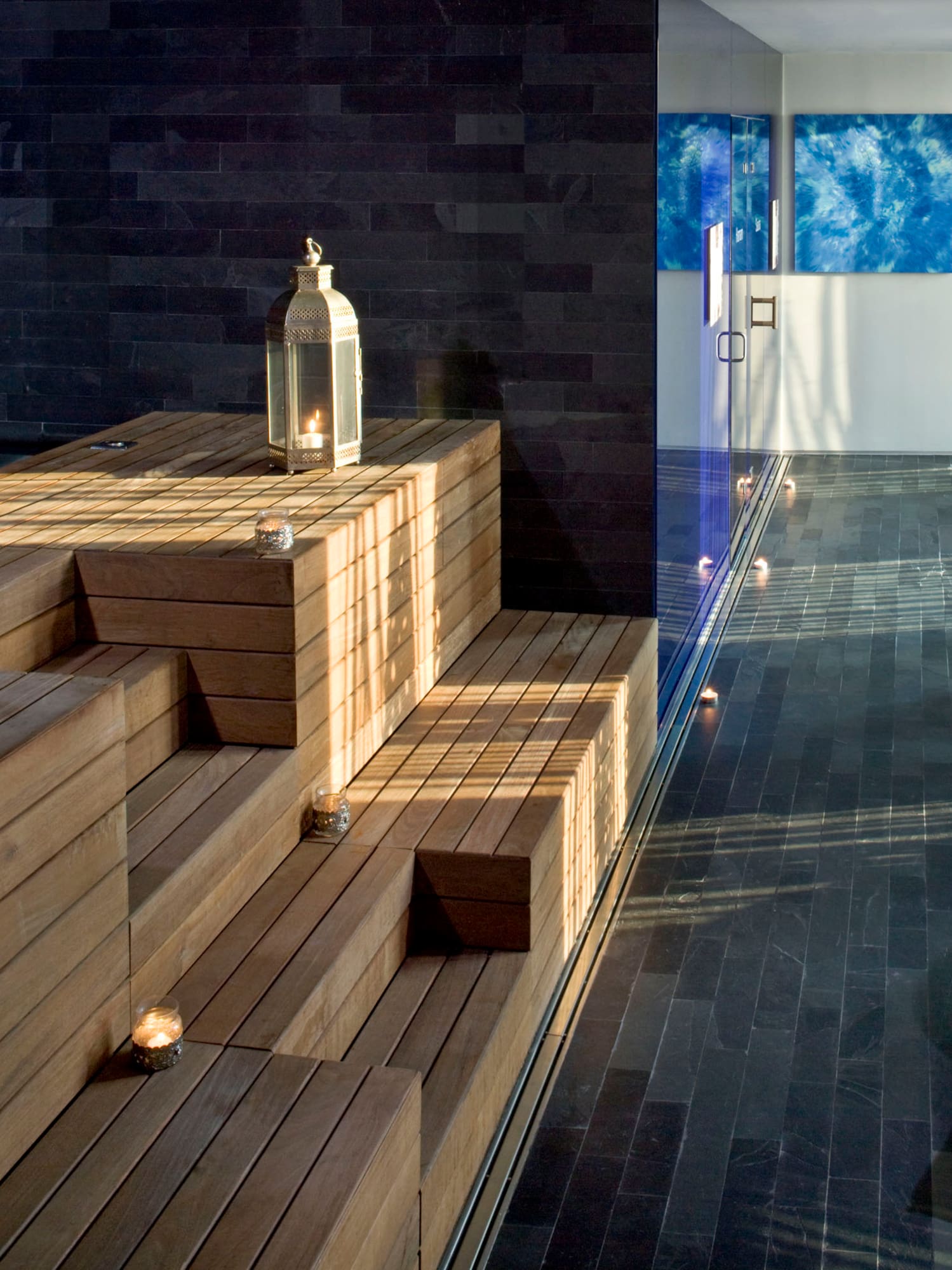 a wooden steps with a lantern on it