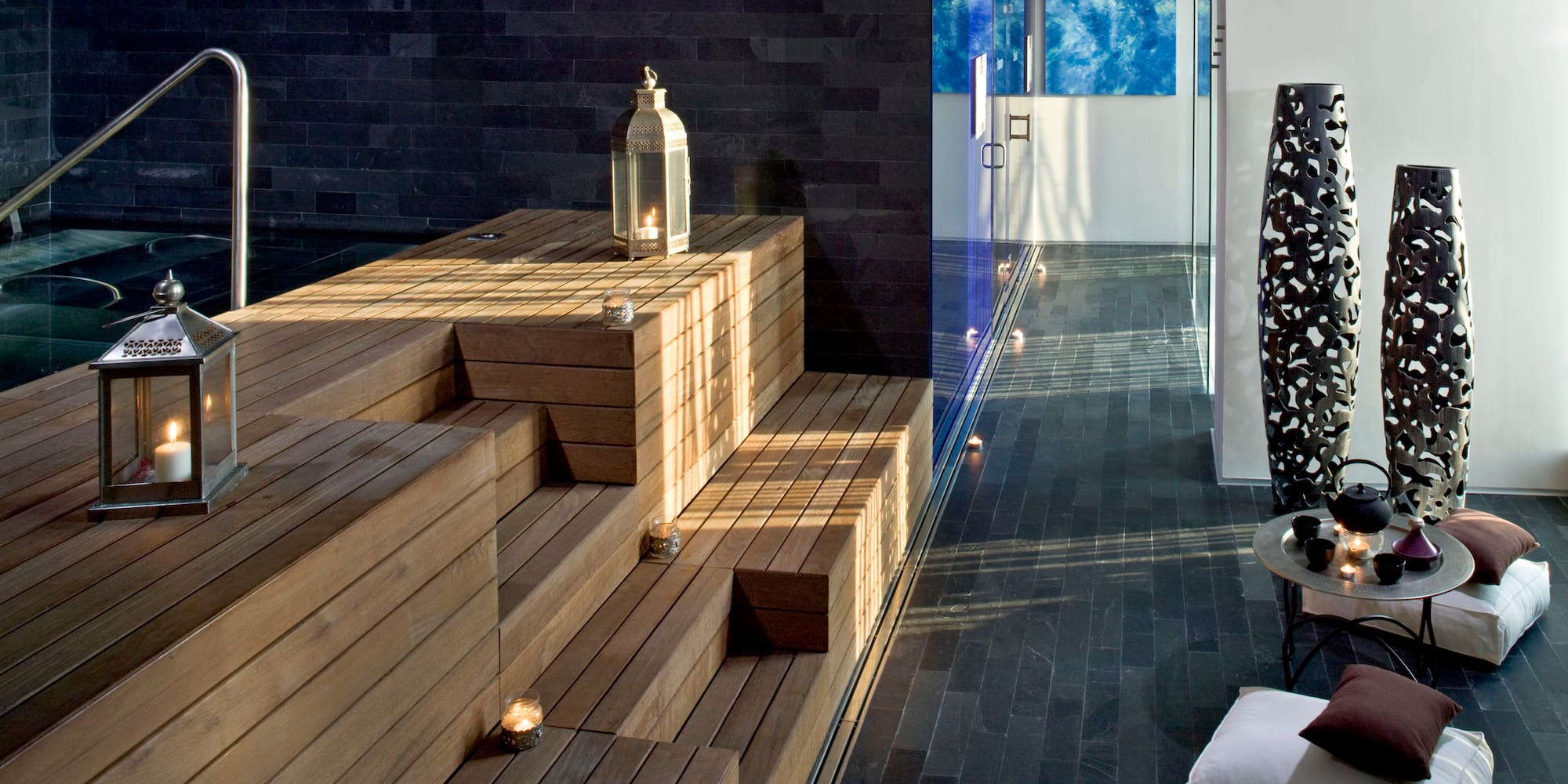 a wooden steps with a lantern on it