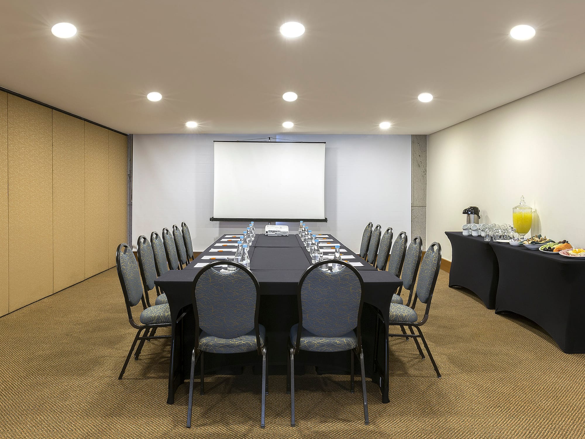 a room with a table and chairs