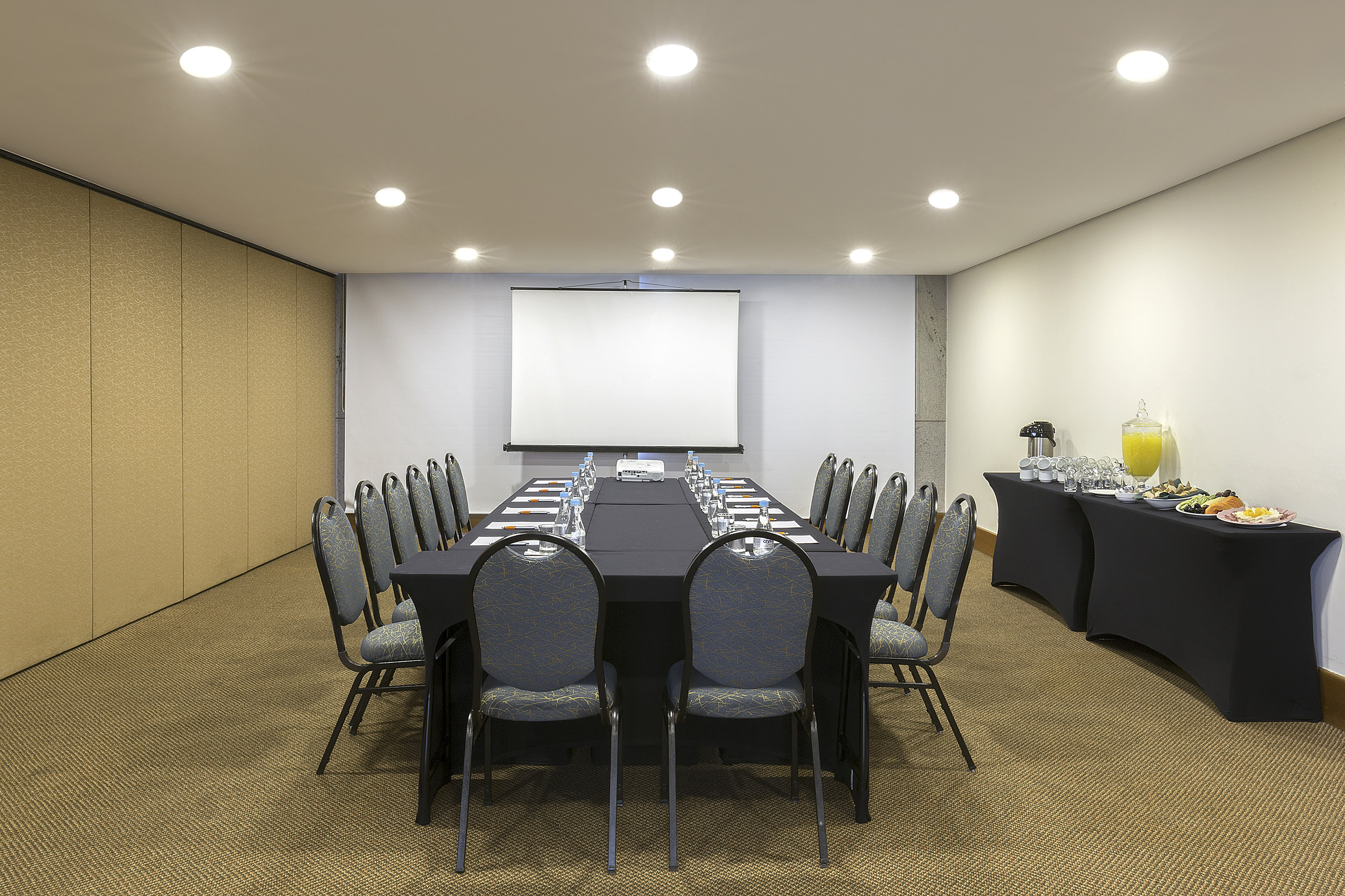 a room with a table and chairs