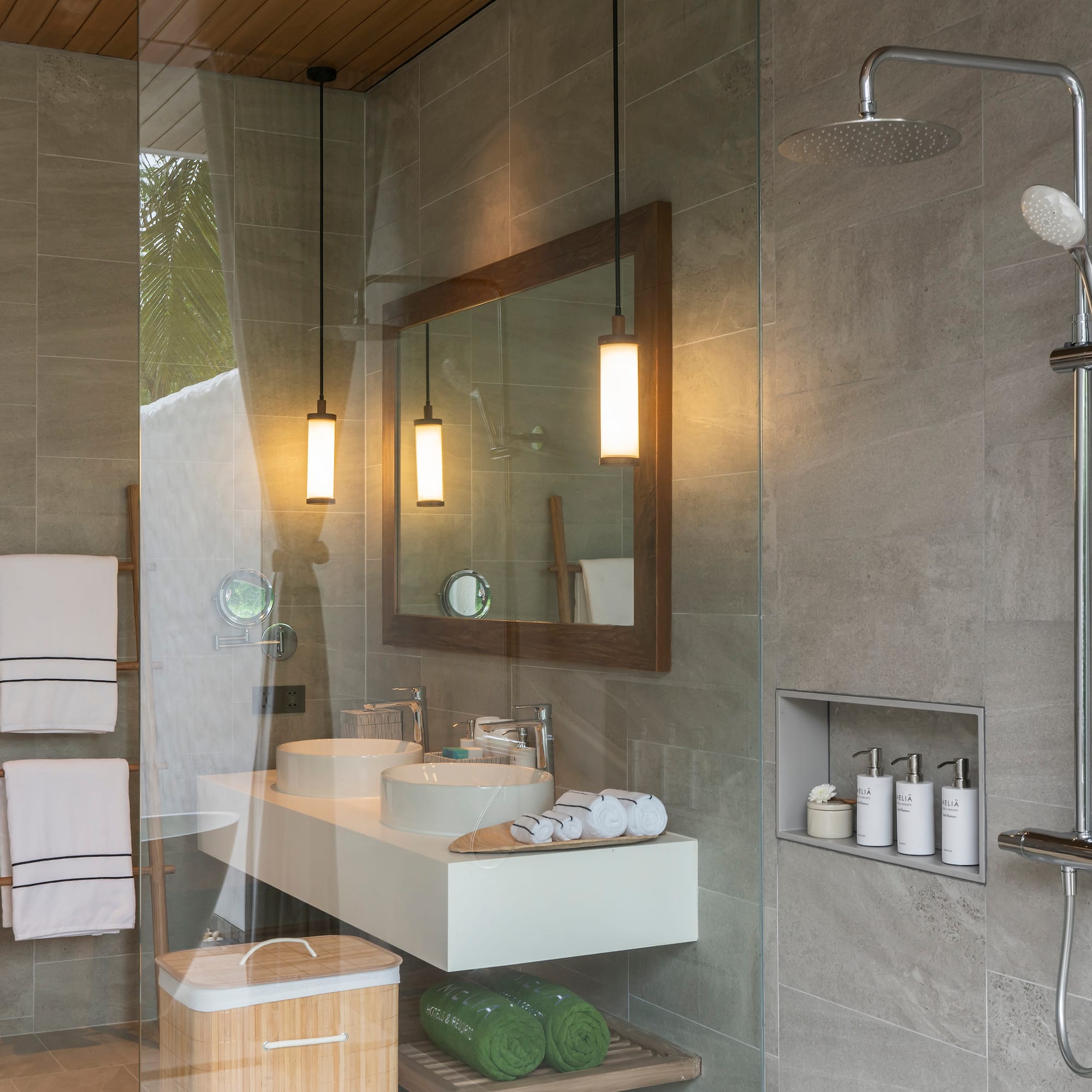 a bathroom with a shower and sink