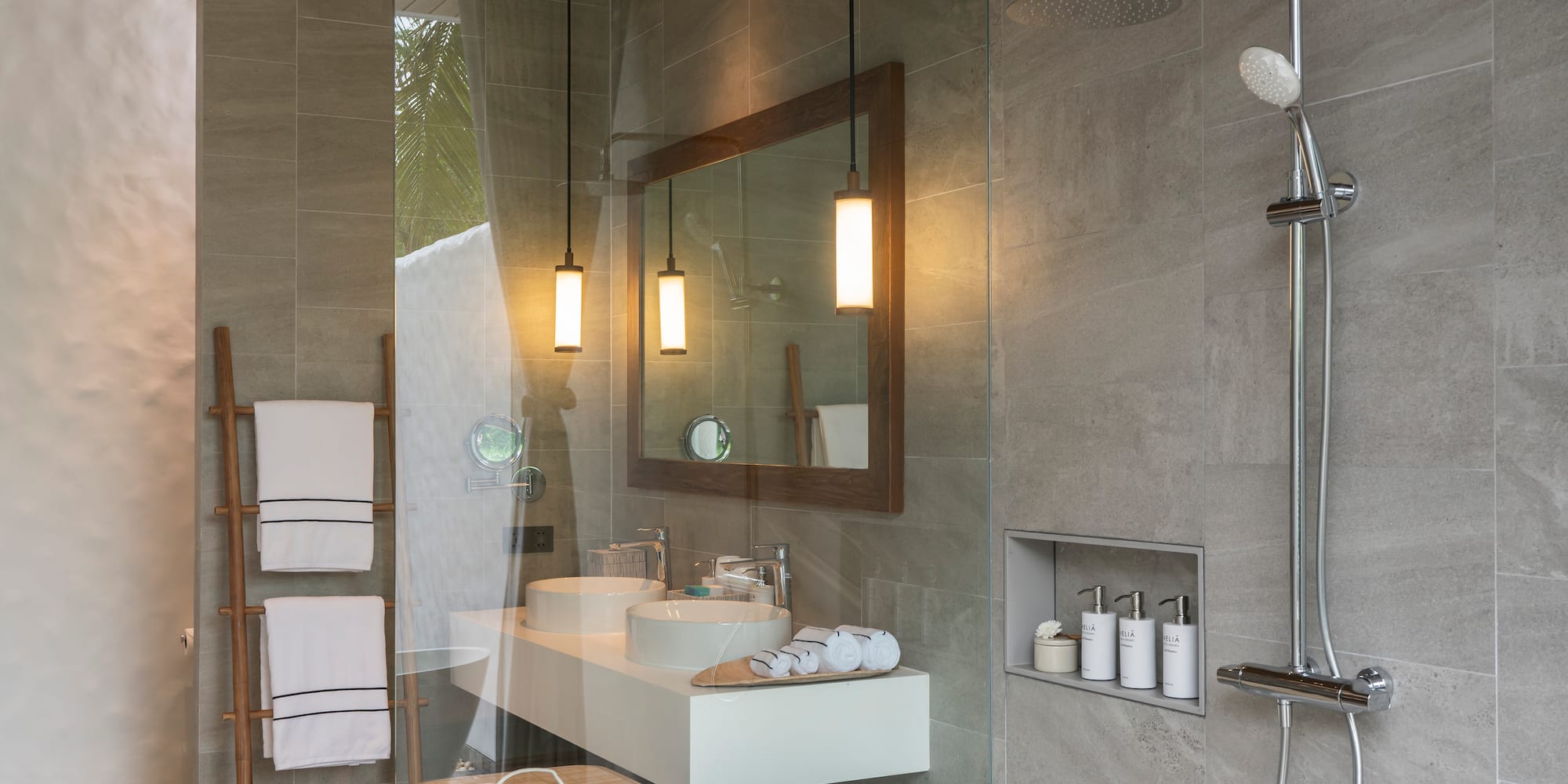 a bathroom with a shower and sink