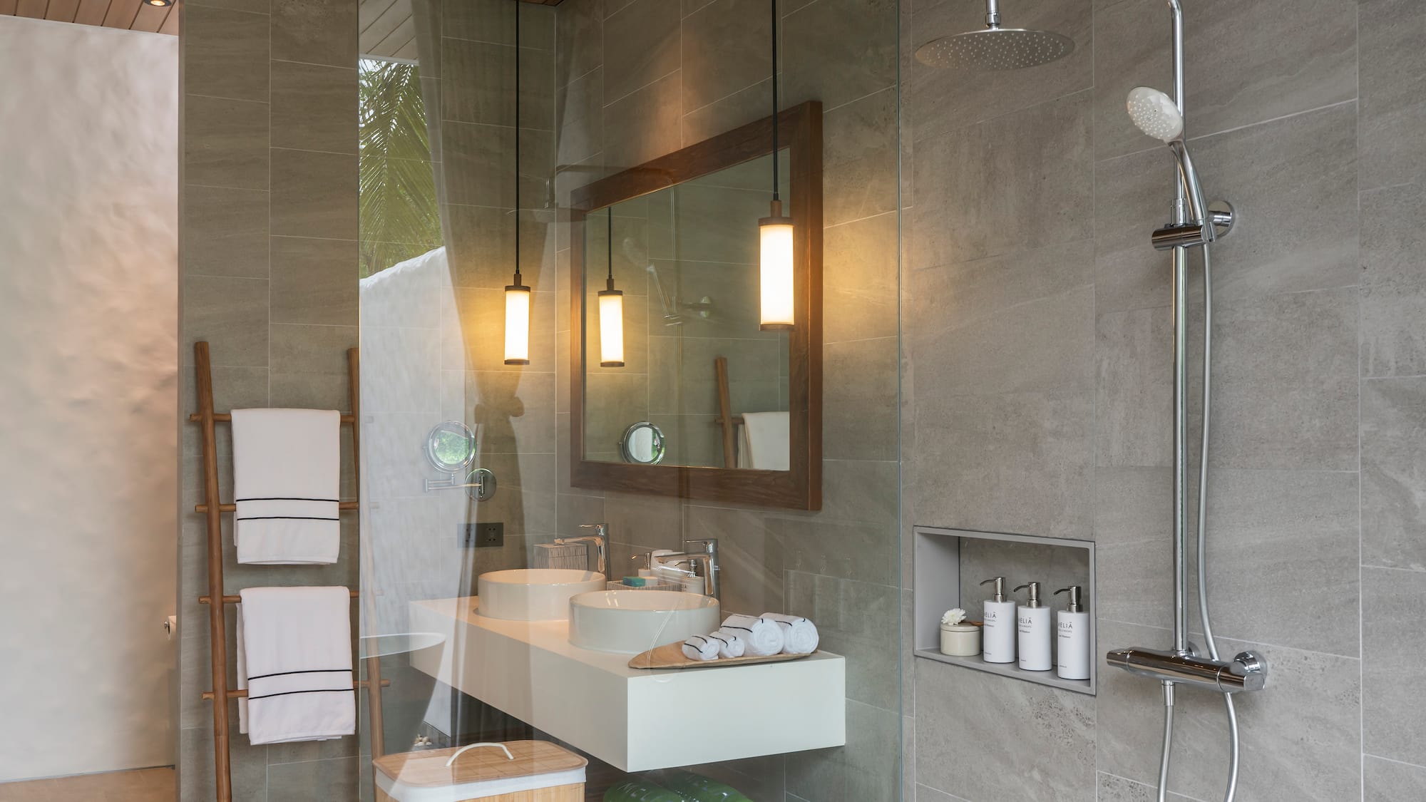 a bathroom with a shower and sink