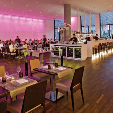 a large room with tables and chairs