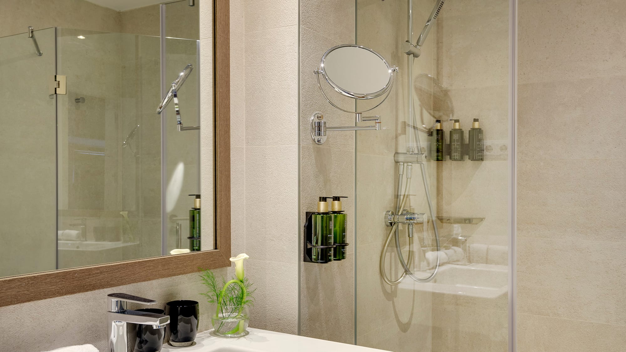 a bathroom with a shower and sink