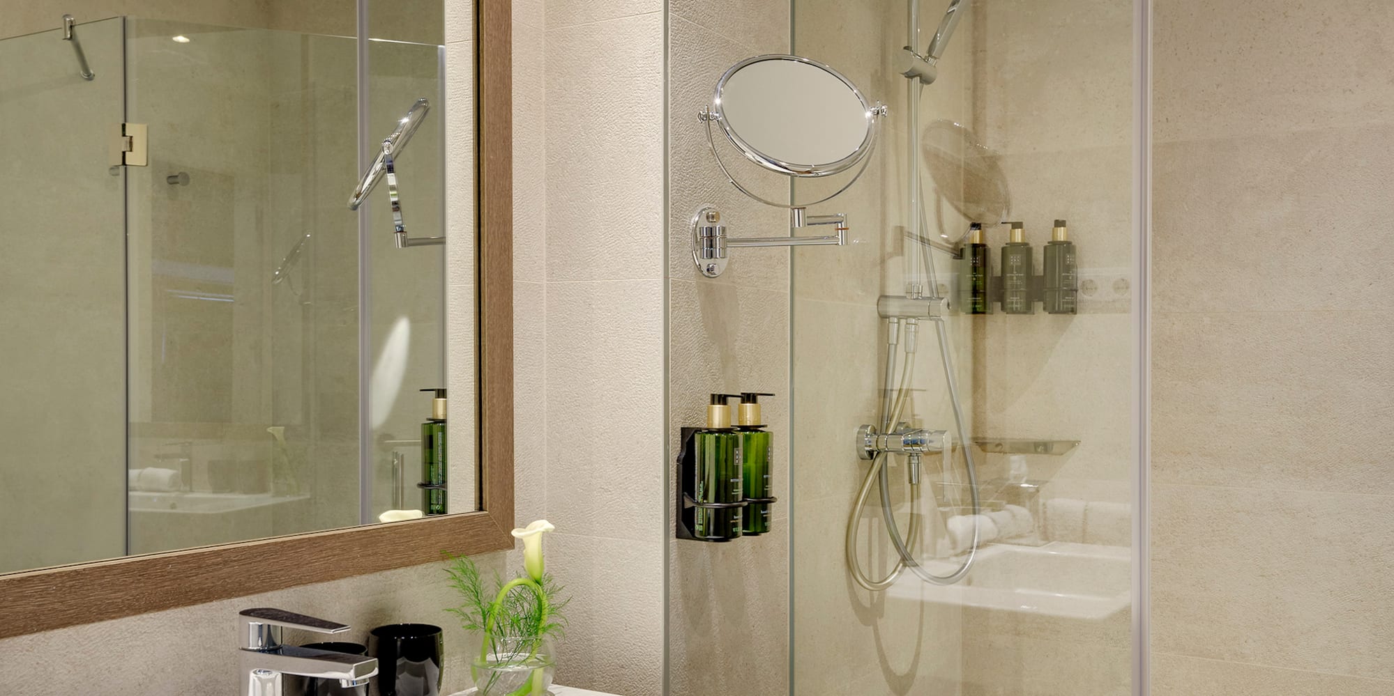 a bathroom with a shower and sink