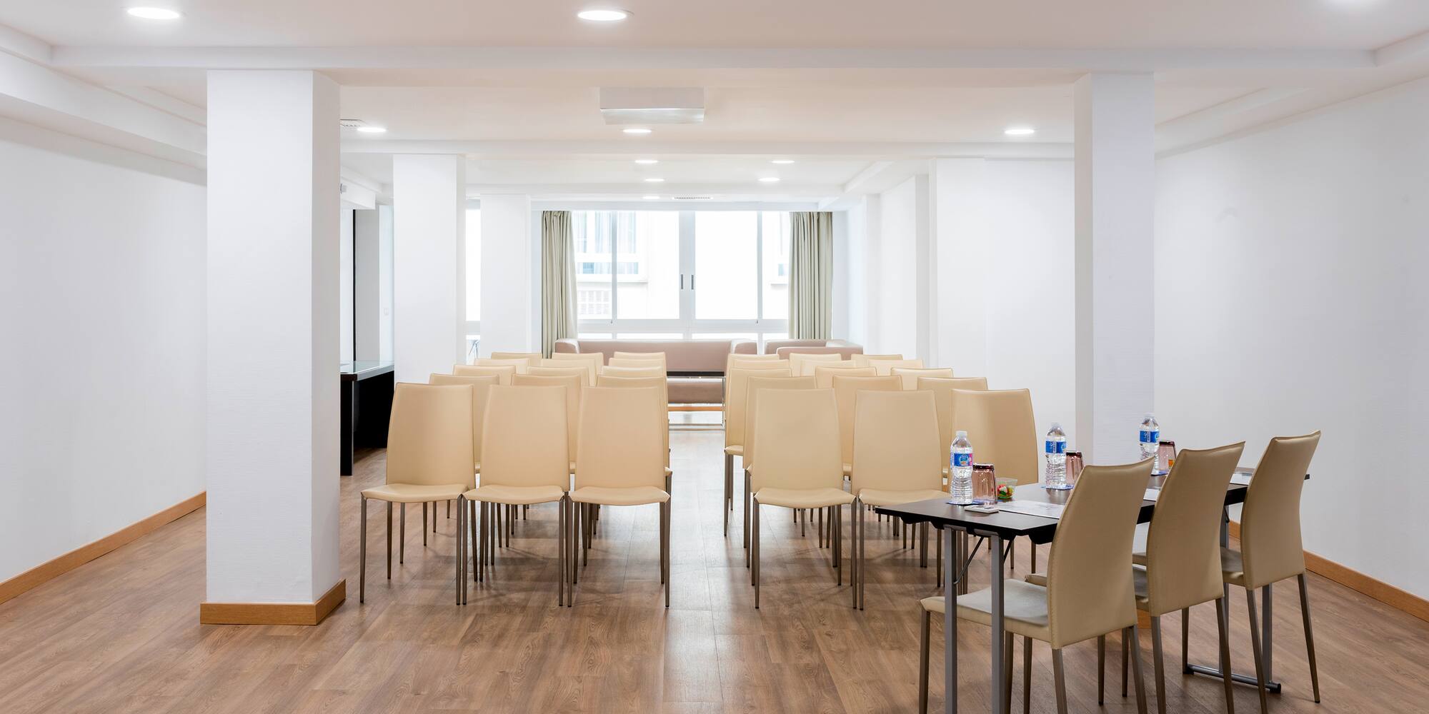 a room with chairs and tables