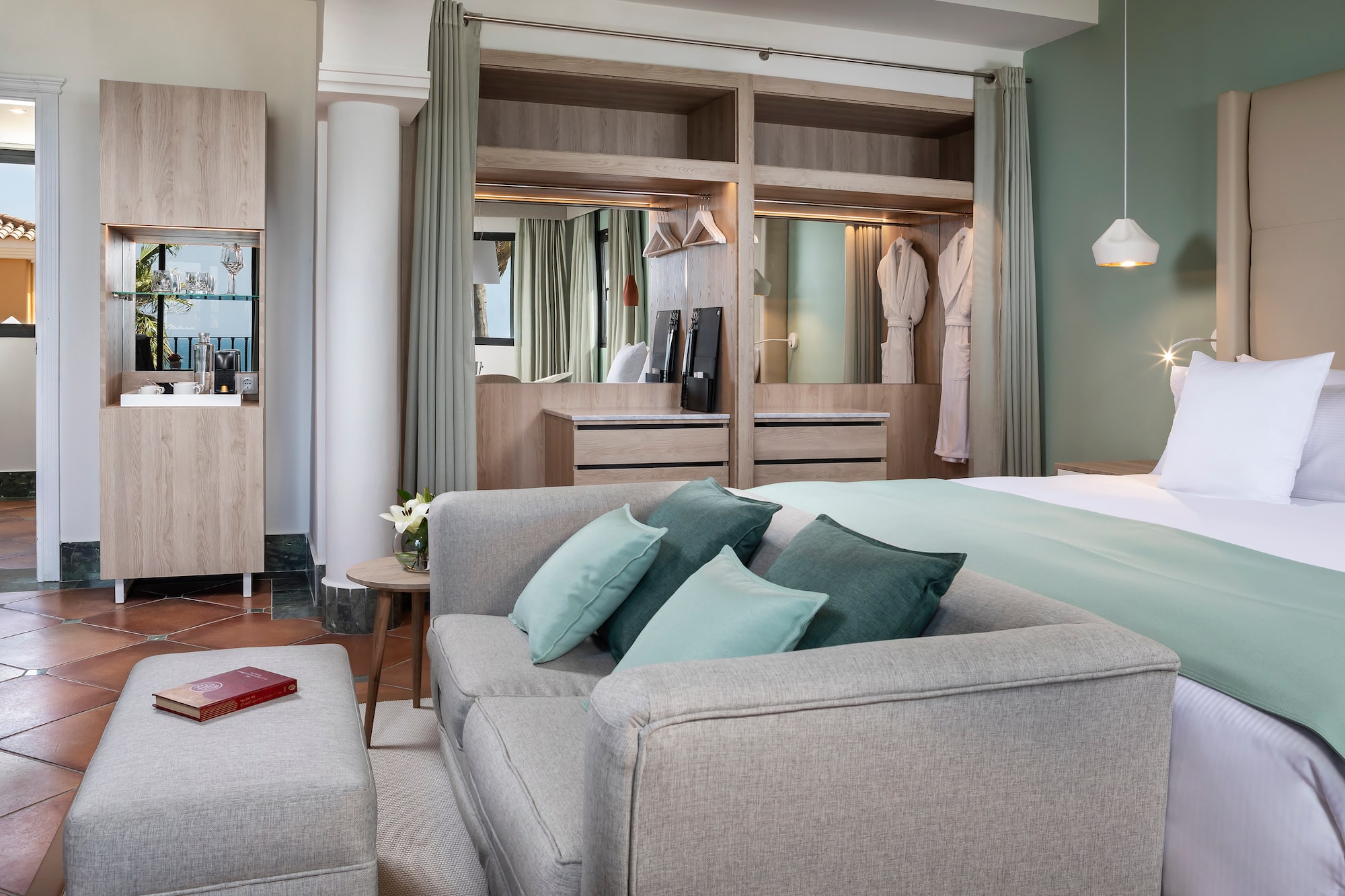 a room with a bed and a couch