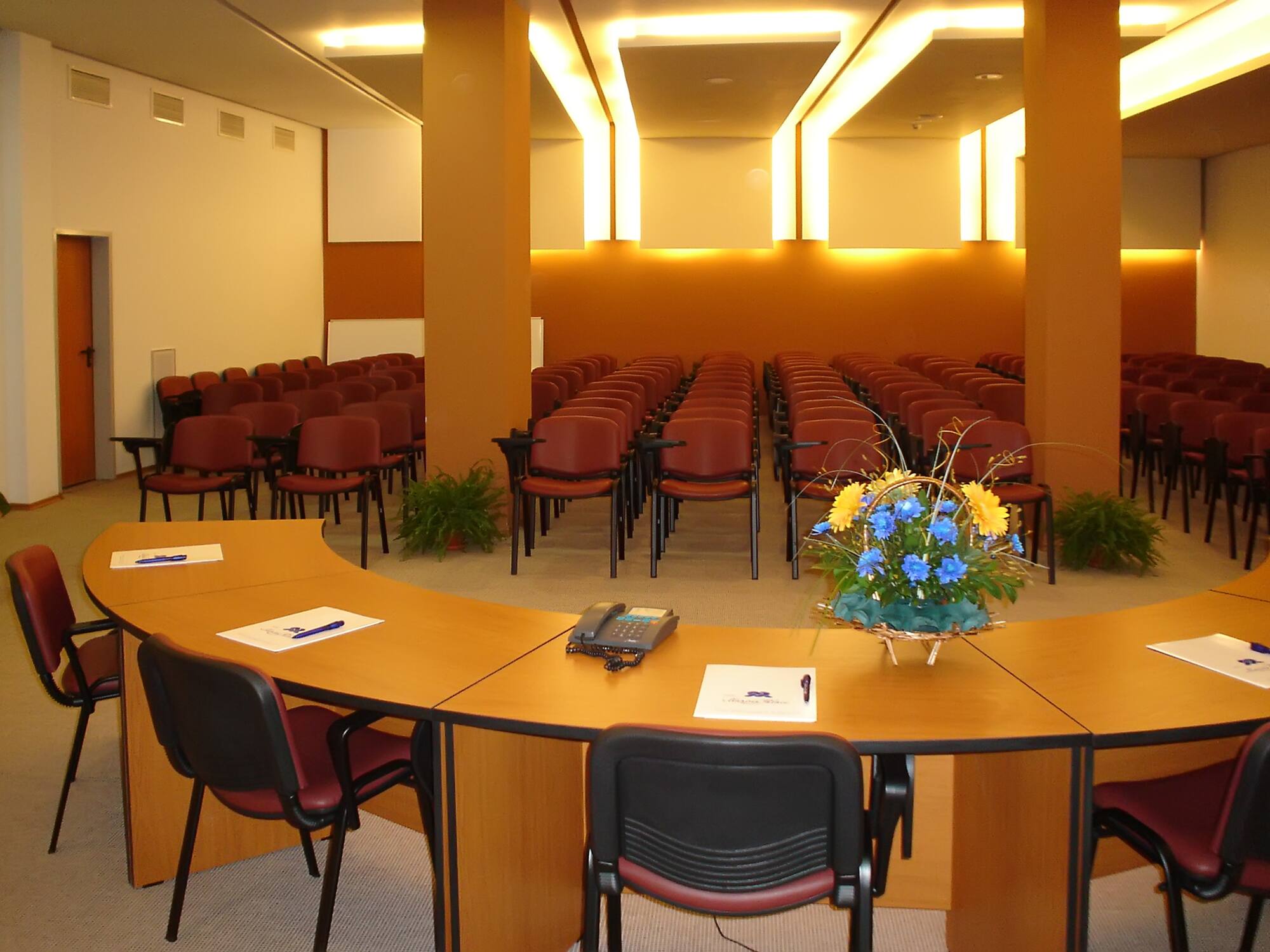 a room with chairs and a table