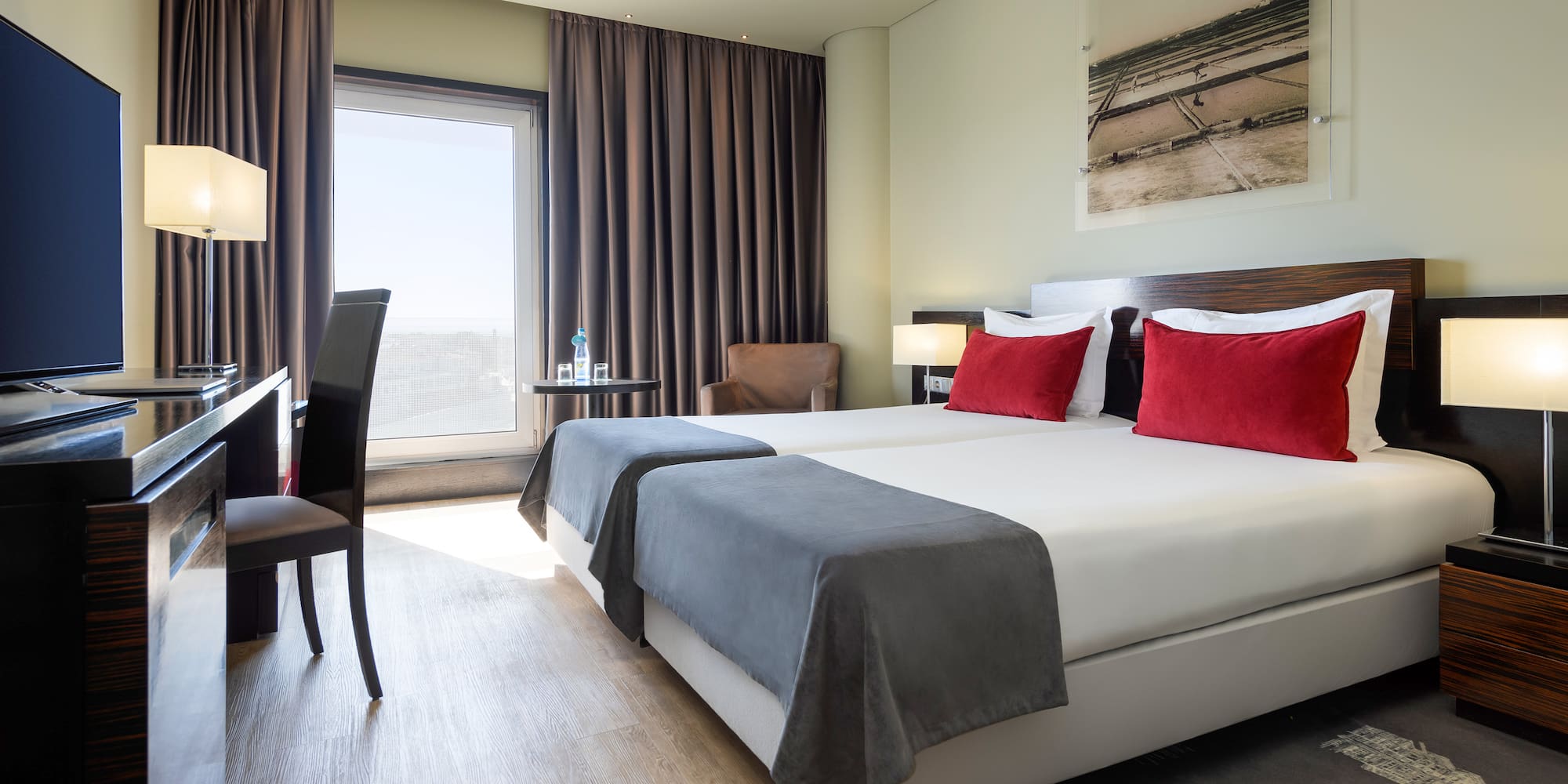 a room with a bed and a chair