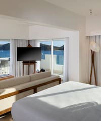 a room with a television and a bed