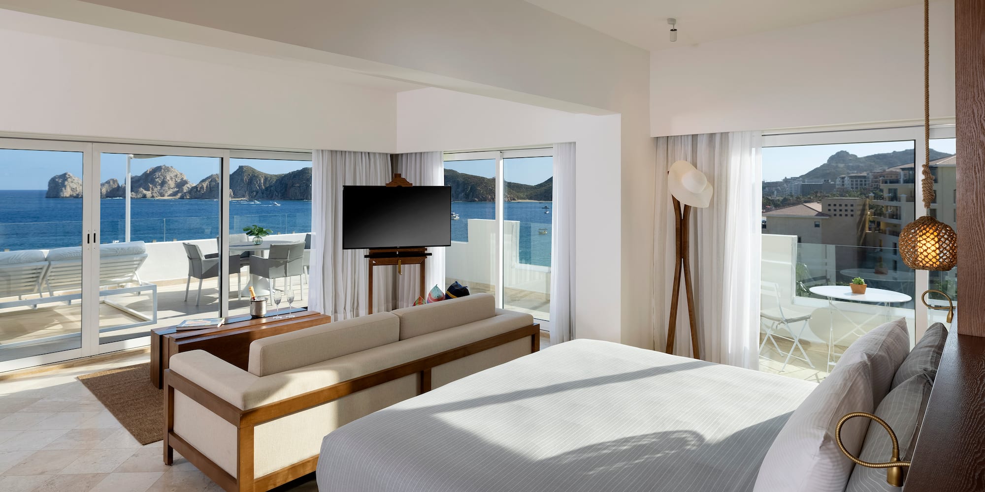 a room with a television and a bed