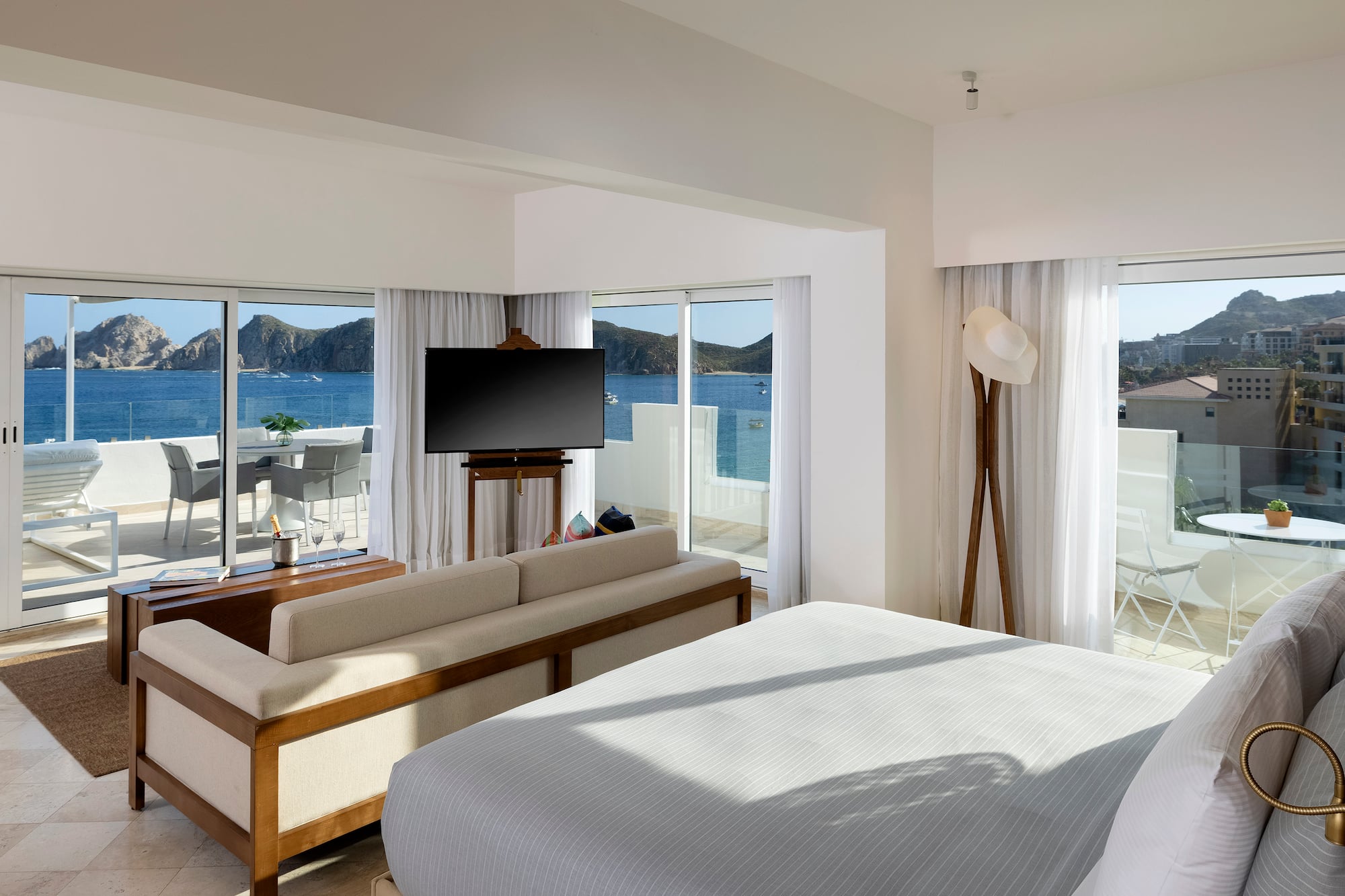 a room with a television and a bed