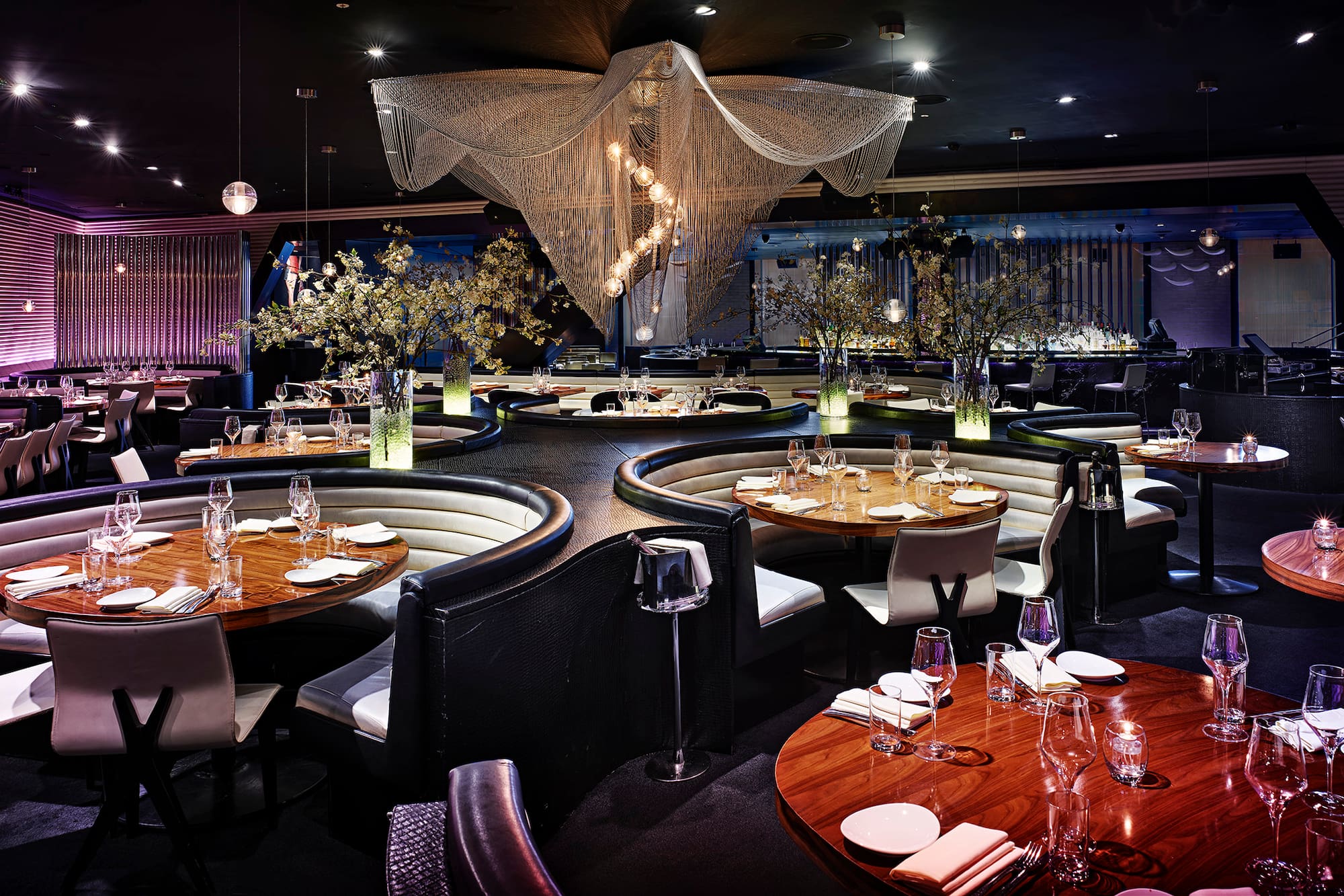 a restaurant with tables and chairs