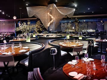 a restaurant with tables and chairs