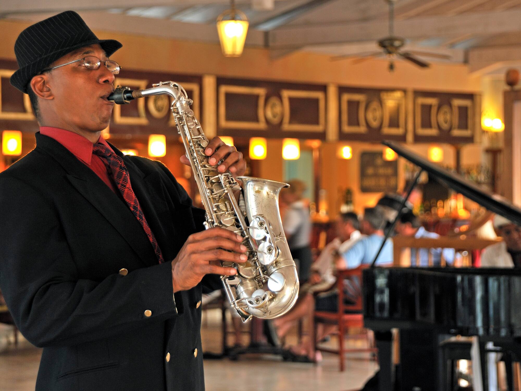 a man playing a saxophone