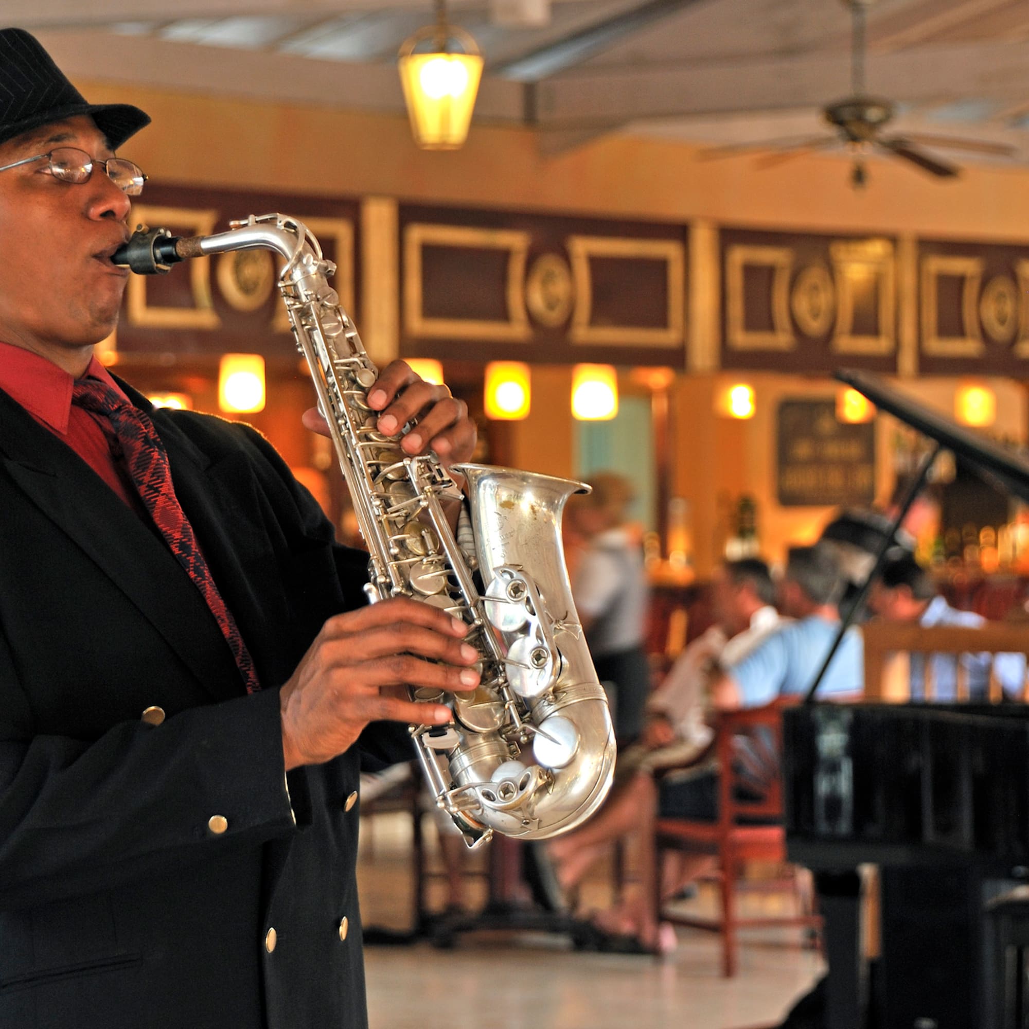 a man playing a saxophone