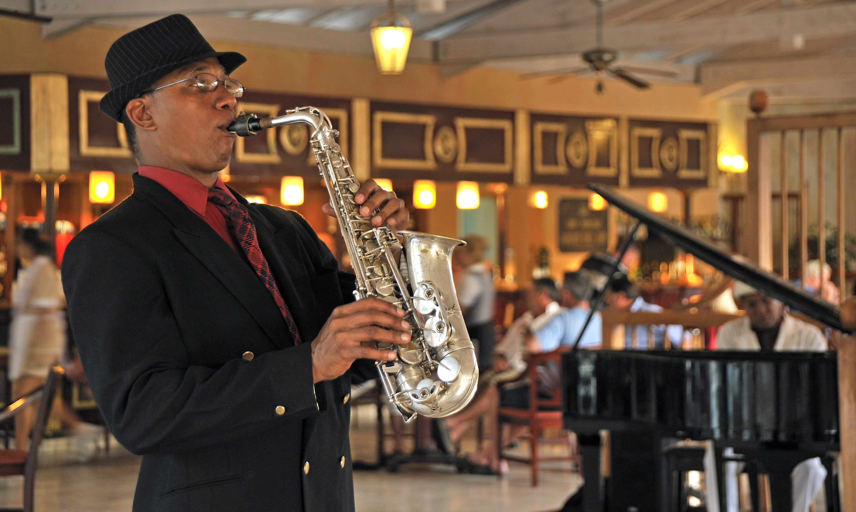 a man playing a saxophone